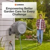 image:imageGARDENA Retractable Garden Hose Reel  100 Feet  Auto Retract Hose Reel with 180 Swivel Wall Mount  Heavy Duty  Includes Spray Nozzle  20505100 ft